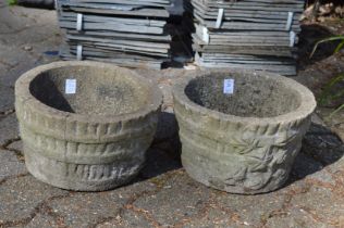 Small pair of reconstituted stone garden pots.