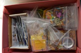 A box of pin badges.