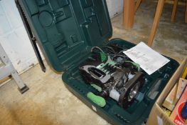A Hitachi router with case and accessories.