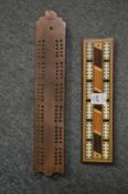 Two cribbage boards.