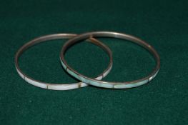 Two enamel bracelets.
