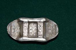 Chinese white metal shoe money.