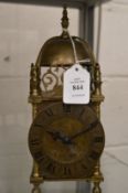 A good small brass lantern clock with clockwork movement.