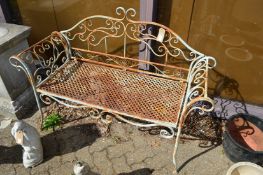 Wrought iron garden bench.