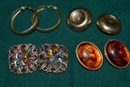 Four pairs of vintage style earrings.