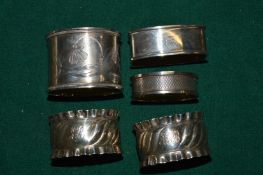 A collection of silver napkin rings.