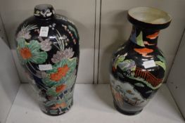 Two large Chinese famille noire vases.