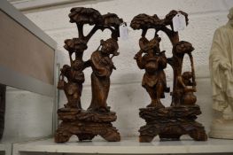 A pair of Chinese root wood carvings.