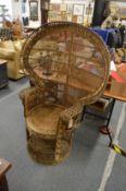A wicker 'Peacock' chair.