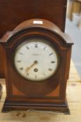 An Edwardian mahogany mantel clock.