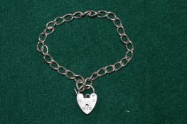 A silver bracelet with padlock clasp.