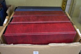 Four albums of cigarette cards.