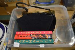 Ladies handbags and books.