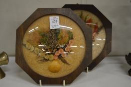 A pair of octagonal framed and glazed three dimensional still lives of flowers in vases.