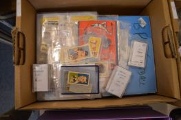 A box of sporting related collector cards.