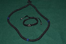 A rope twist necklace and similar bracelet.