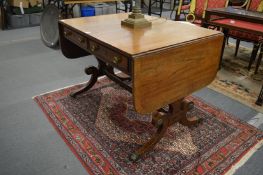 A 19th century rosewood sofa table.