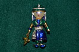 A vintage brooch modelled as an Egyptian woman.