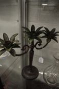 A pair of palm tree twin branch candelabra.