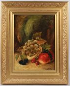 T E STUBBS Still life of fruit in a basket oil on board signed 38.5 x 28.5cm