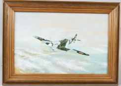 AVIATION INTEREST Spitfire over a coastline oil on board signed indistinctly 22.5 x 34.5cm