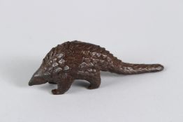 A JAPANESE BRONZE PANGOLIN. 10cms long.