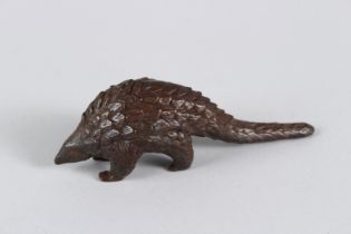 A JAPANESE BRONZE PANGOLIN. 10cms long.