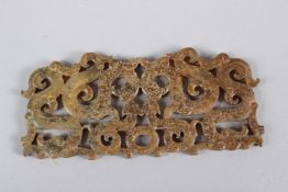 A PIERCED AND CARVED JADE TABLET. 13.5cms long.