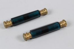 A PAIR OF LATE 19TH CENTURY TURQUOISE GLASS DOUBLE ENDED SCENT BOTTLES.