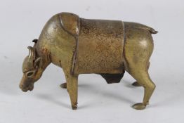 A 17TH CENTURY SOUTH INDIAN BRONZE BULL SHAPED OIL DROPPER. 10cms high