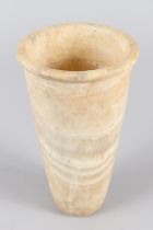 AN EGYPTIAN ALABASTER VESSEL, OLD KINGDOM, Circa. 3000-2600 BC, of cylindrical tapering form.