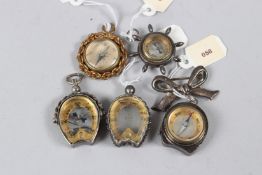 A COLLECTION OF FIVE MINIATURE COMPASSES.