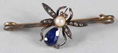 A YELLOW METAL, DIAMOND, SAPPHIRE AND PEARL BUG BROOCH, in a fitted box. 4cms wide.