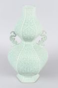 A FINE CHINESE CELADON CARVED 