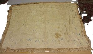 A 19TH CENTURY OTTOMAN TURKISH TEXTILE, beige ground, embroidered all over with green and blue silks