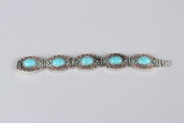 A TIBETAN WHITE METAL BRACELET. 23cms long.