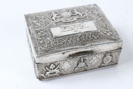 A 20TH CENTURY MALAYSIAN STERLING SILVER BOX presented by the Prime Minister. 13cms wide