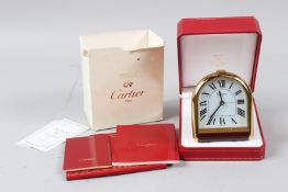 A LOUIS CARTIER OF PARIS QUARTZ TRAVELLING CLOCK, No. 10353, in original box with paperwork. 8.