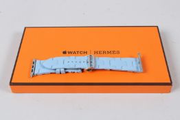 A PAIR OF HERMES BOXED PALE BLUE WATCH STRAPS.