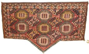 AN ANTIQUE TURKMEN OR TURKISH WOOLLEN ASMALYK (HANGING). 130cms x 80cms.