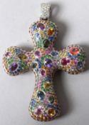 A HIGHLY IMPRESSIVE WHITE GOLD CRUCIFIX, profusely set all over to one side with multi-coloured