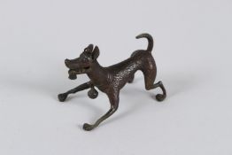 A JAPANESE BRONZE DOG. 6cms long.