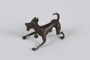 A JAPANESE BRONZE DOG. 6cms long.