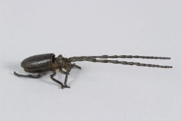 A JAPANESE OKIMONO ARTICULATED LONGHORN BEETLE. 14cms long.