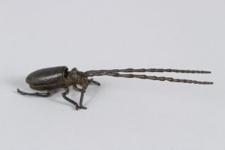 A JAPANESE OKIMONO ARTICULATED LONGHORN BEETLE. 14cms long.