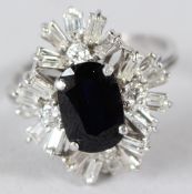 AN 18K WHITE GOLD, SAPPHIRE AND DIAMOND OVAL RING.