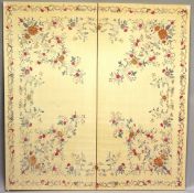 A 20TH CENTURY CHINESE SILKWORK PANEL, in two parts, beige ground, embroidered with floral sprays to