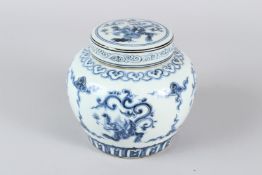 A CHINESE BLUE AND WHITE GINGER JAR AND COVER. 13cms high.
