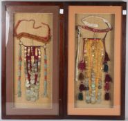 TWO EARLY 20TH CENTURY BEDOUIN NIQAB HEADDRESSES, NORTHERN SINAI, EGYPT, framed and glazed. 85cms