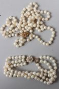 A PEARL SINGLE STRAND NECKLACE, with decorative 9ct gold clasp; together with a similar three row